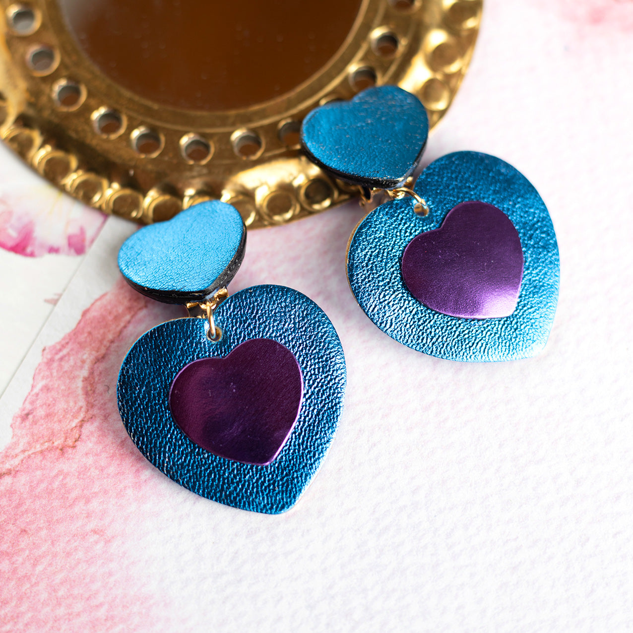 Boucles d'oreilles à clips Double Coeurs - cuir bleu et violet métallisé