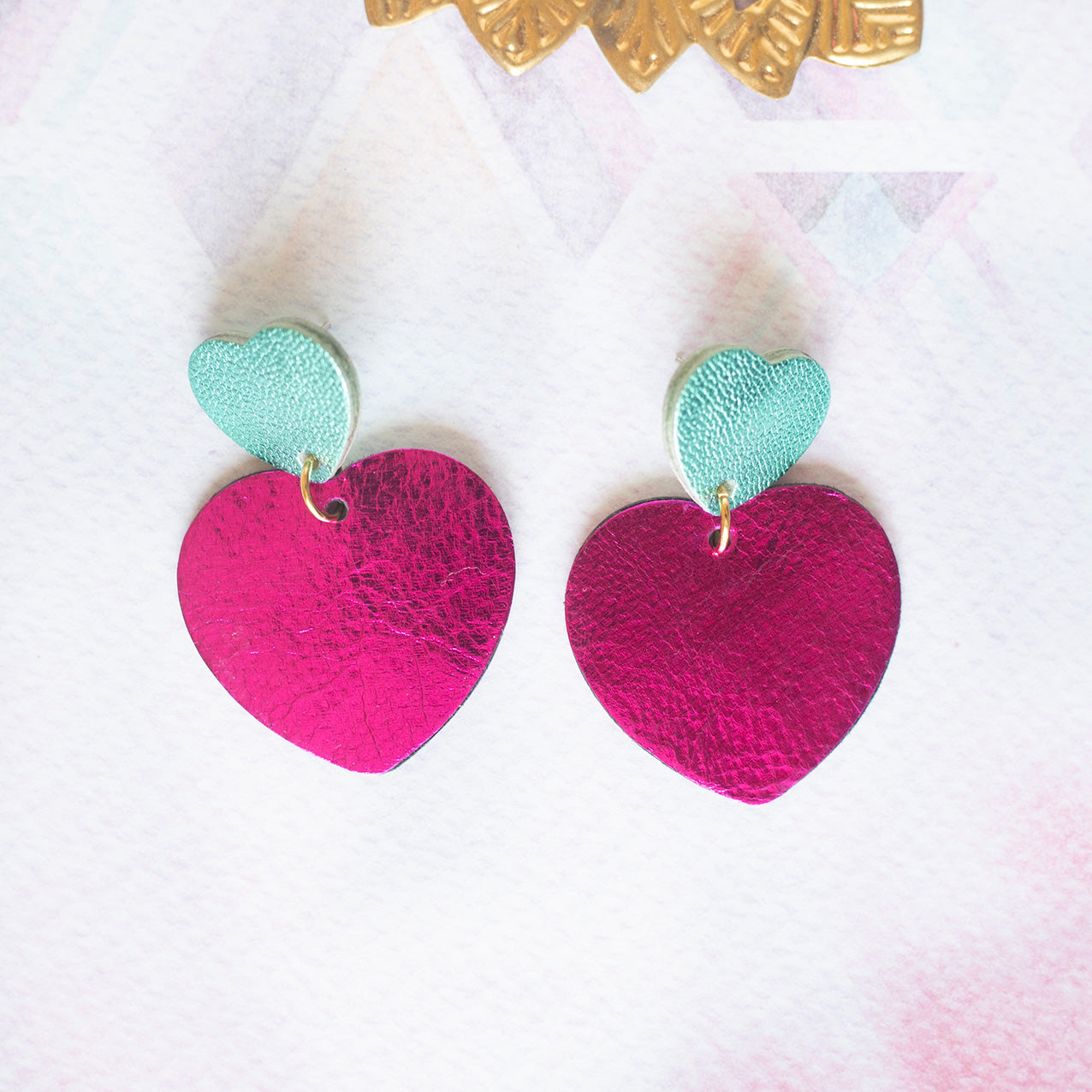 Boucles d'oreilles double Coeurs rose fuchsia et bleu turquoise métallisé