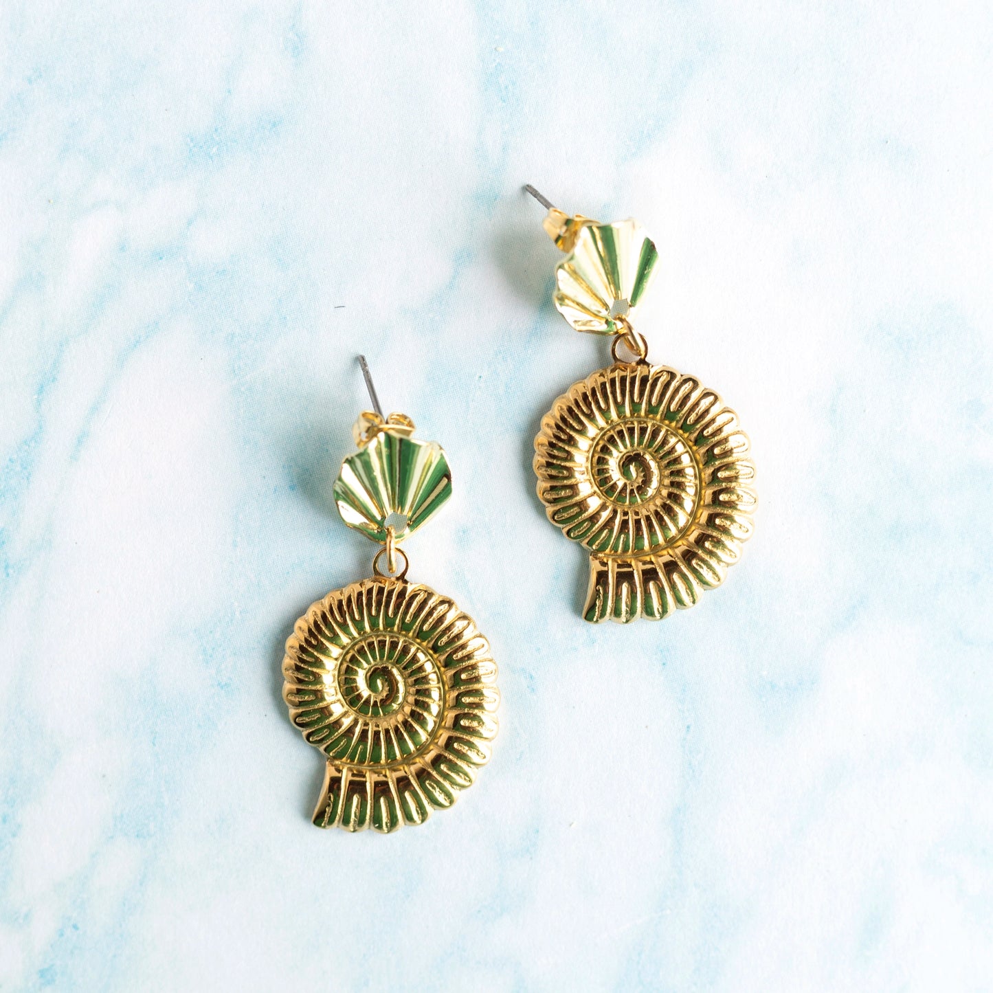 Boucles d'oreilles Nautilus - acier doré