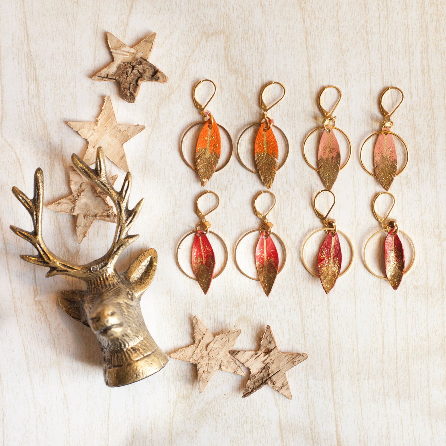 Boucles d'oreilles créoles plumes cuir orange clair