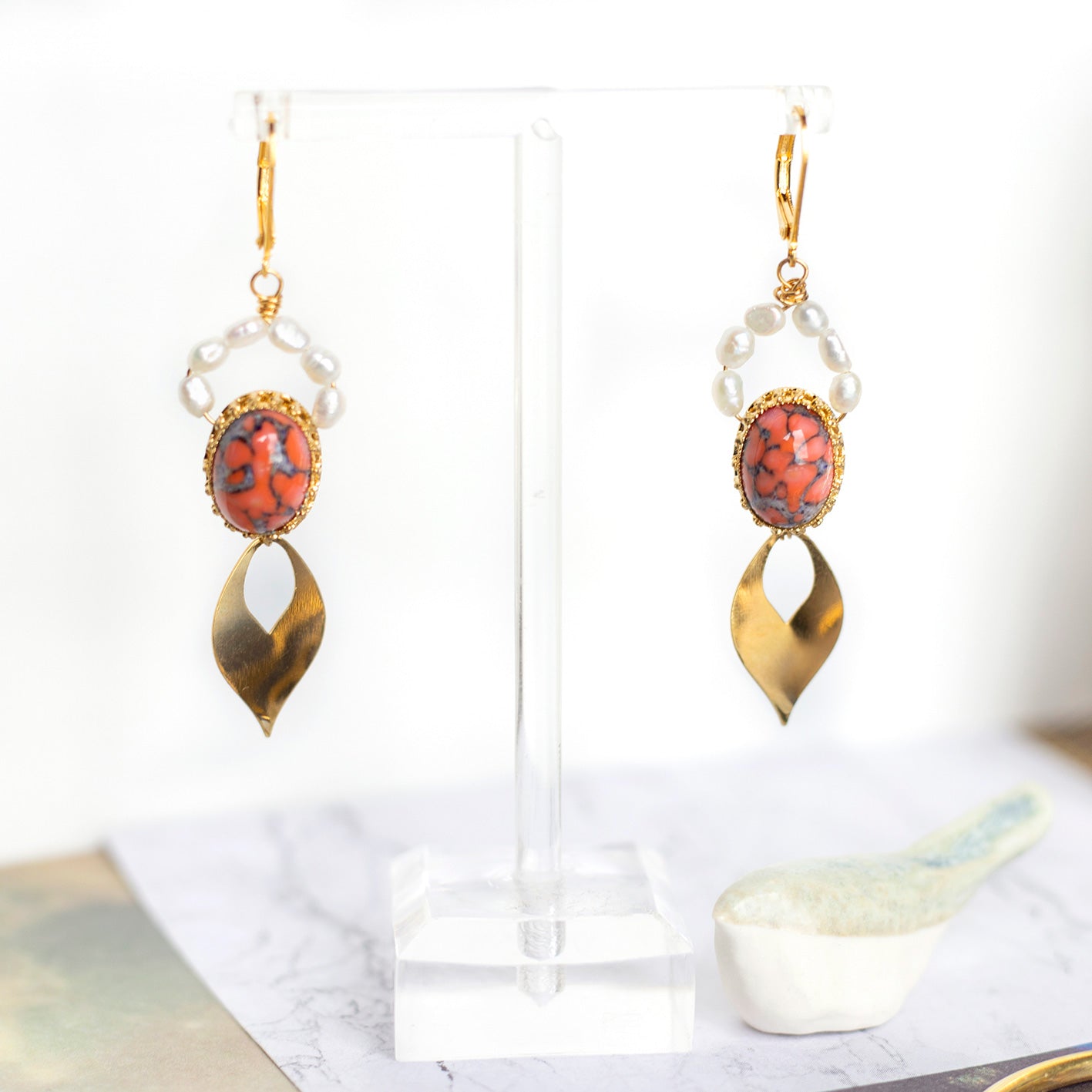 Vintage cabochon earrings in orange glass and freshwater pearls