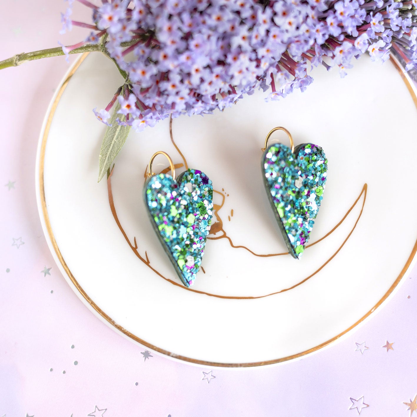Boucles d'oreilles coeurs bleus à paillettes