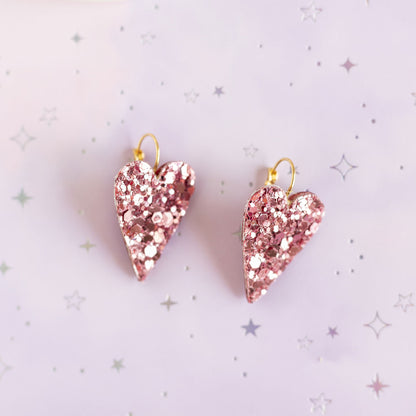 Boucles d'oreilles coeurs roses à paillettes