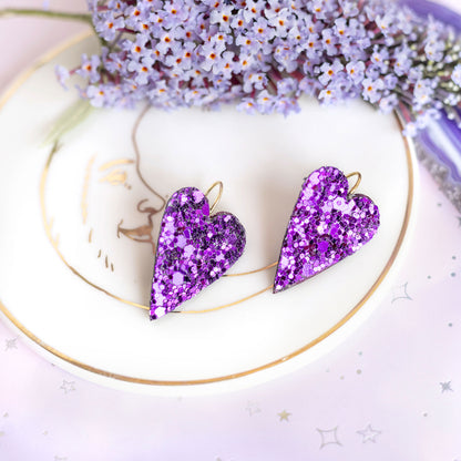 Boucles d'oreilles coeurs violets à paillettes
