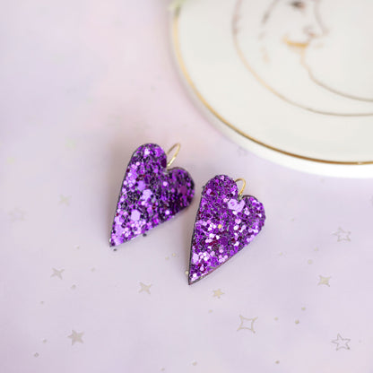 Boucles d'oreilles coeurs violets à paillettes