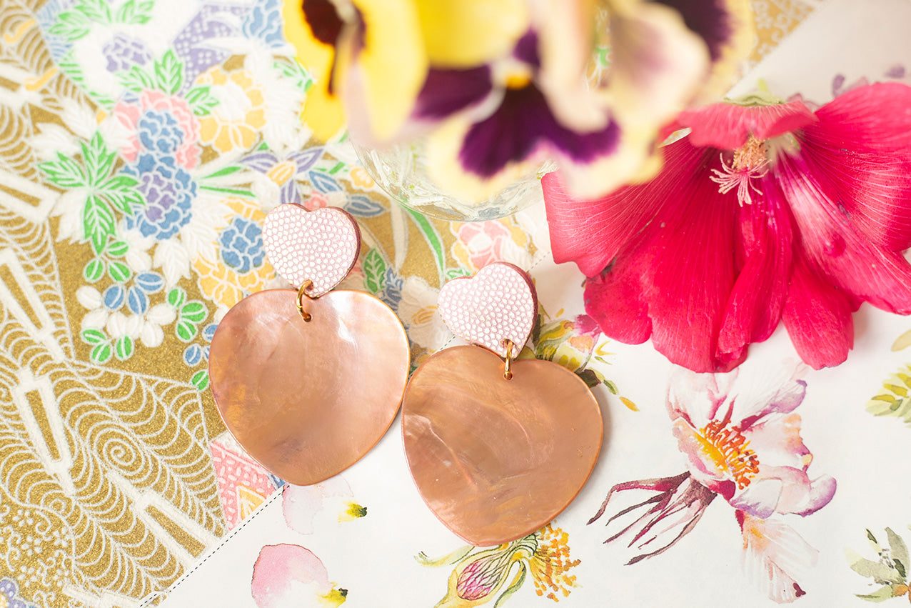 Double Hearts earrings in pink leather with gold polka dots and mother-of-pearl hearts