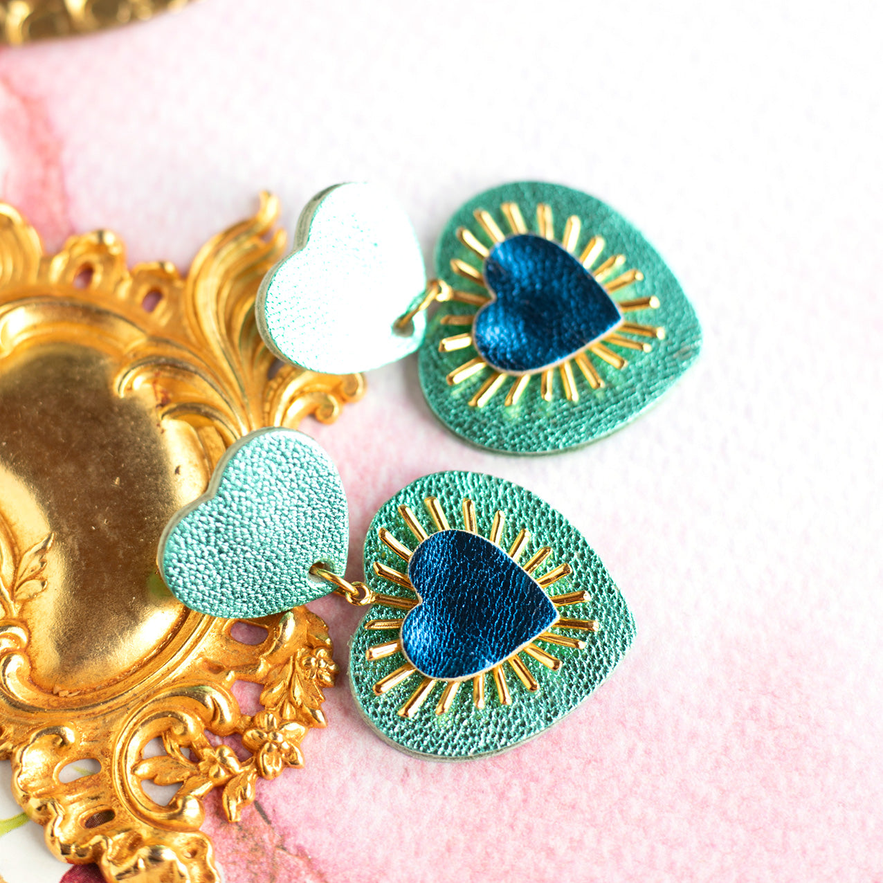 Sacré Coeur earrings in metallic turquoise and royal blue leather