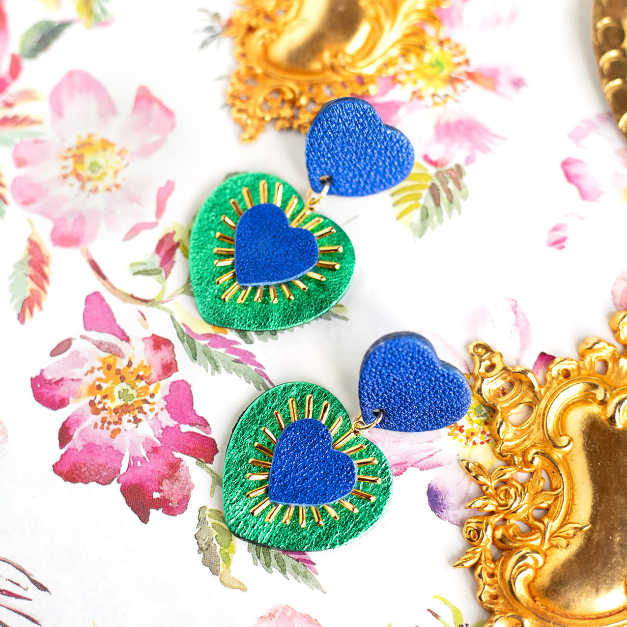 Sacré Coeur earrings in ultramarine blue and metallic green leather