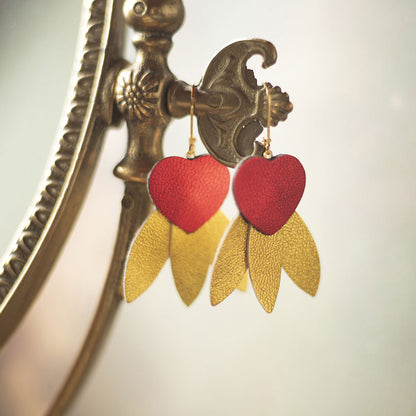 Boucles d'oreilles Coeurs rouge métallisé et 3 épées