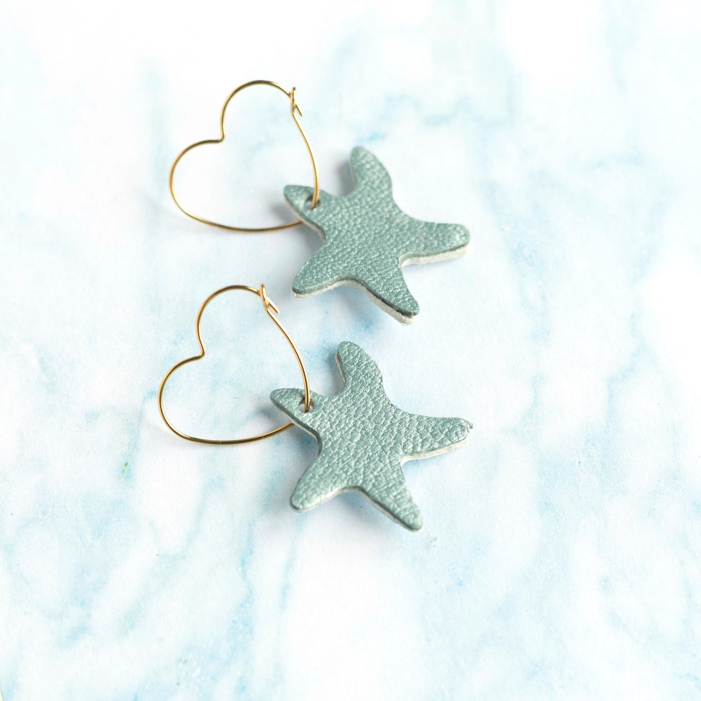 Boucles créoles Etoiles de mer holographique