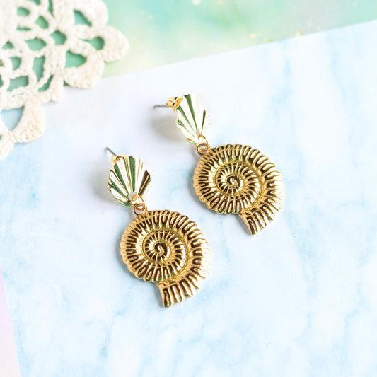 Boucles d'oreilles Nautilus - acier doré