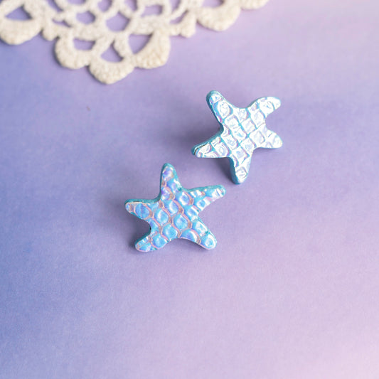Boucles d'oreilles puces Étoiles de mer cuir blanc holographique
