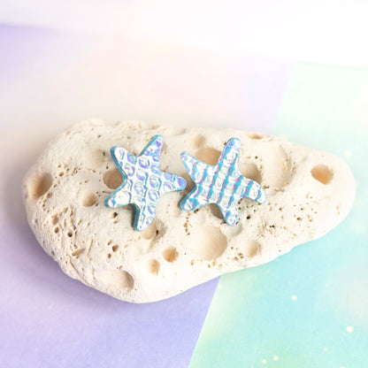 Boucles d'oreilles puces Étoiles de mer cuir blanc holographique