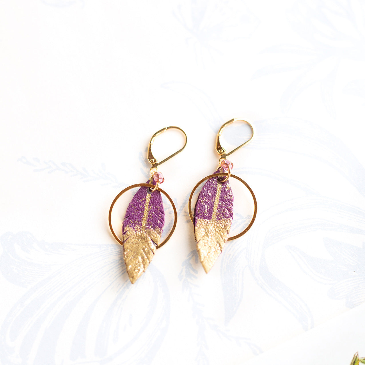Purple leather feather hoop earrings