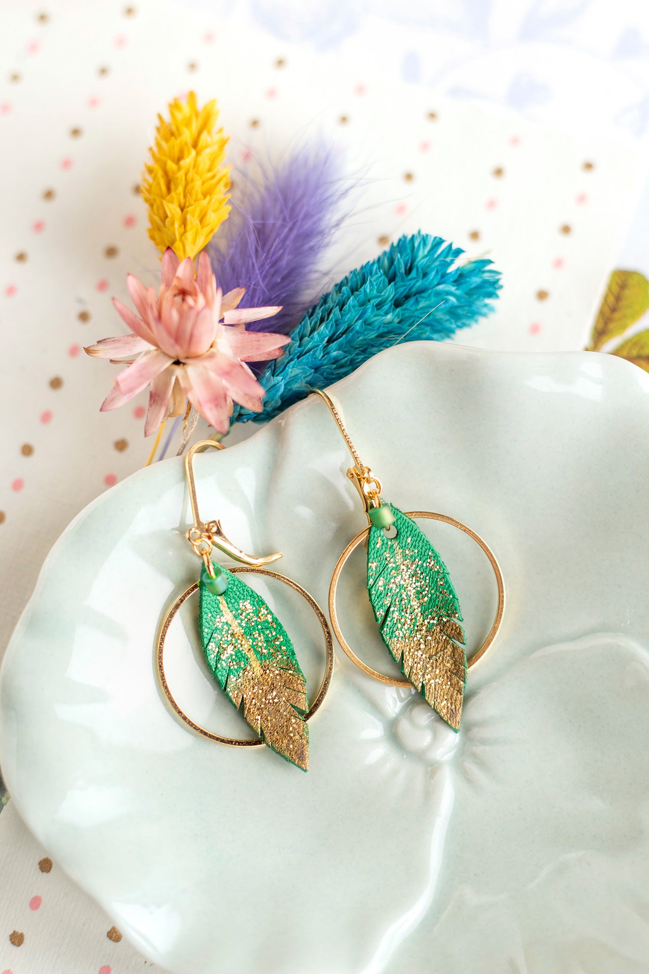 Mint green leather feather hoop earrings