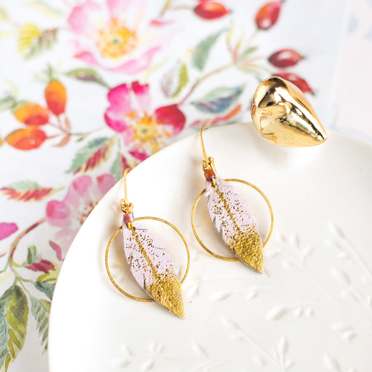 Pale pink and gold leather feather hoop earrings