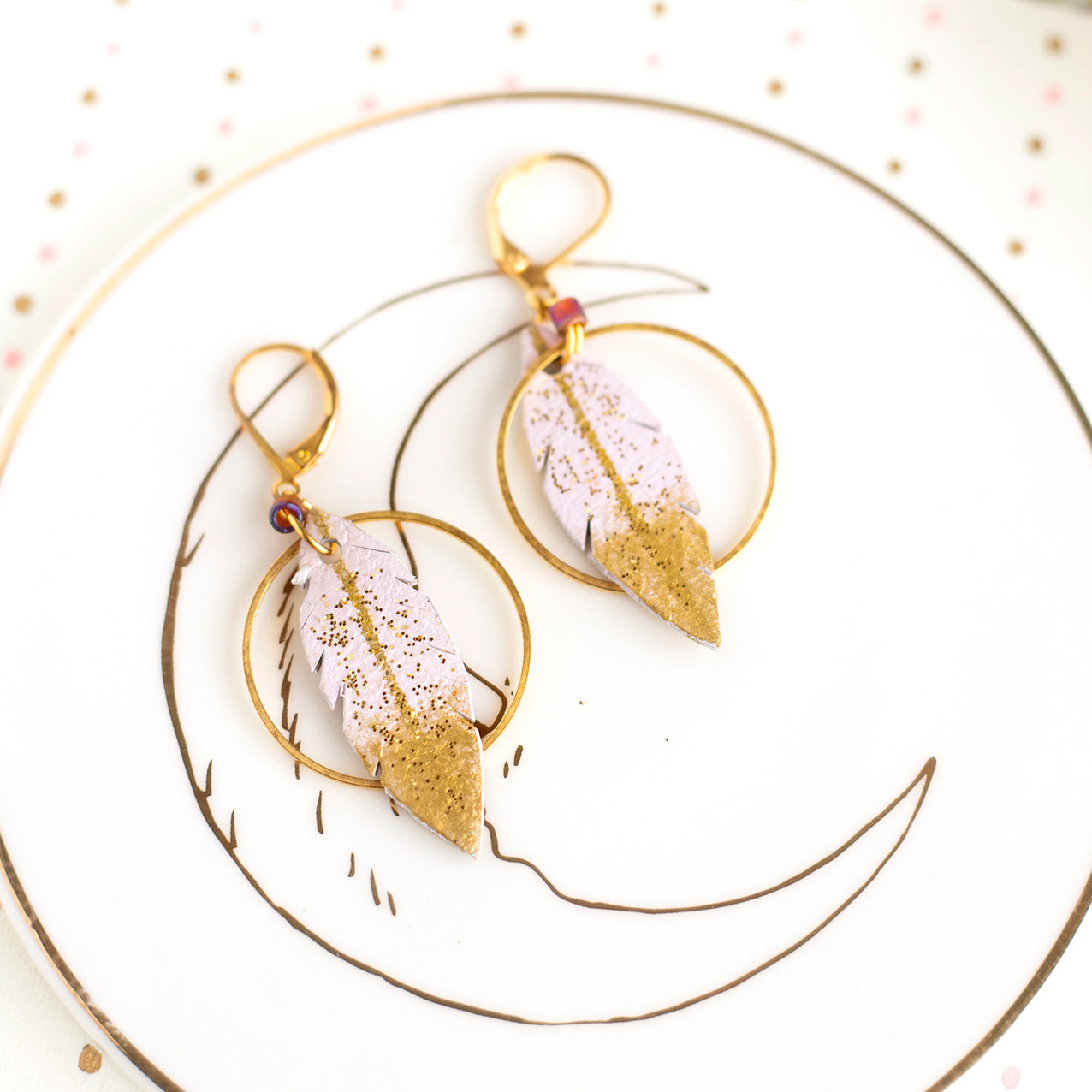 Pale pink and gold leather feather hoop earrings