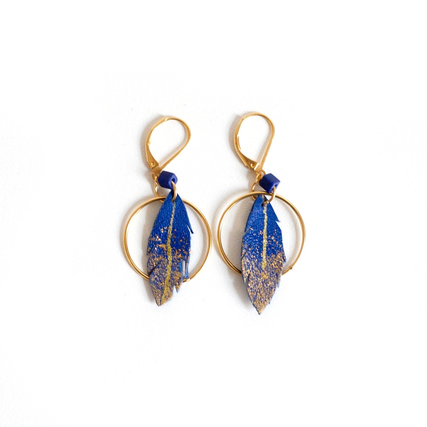 Electric blue leather feather hoop earrings