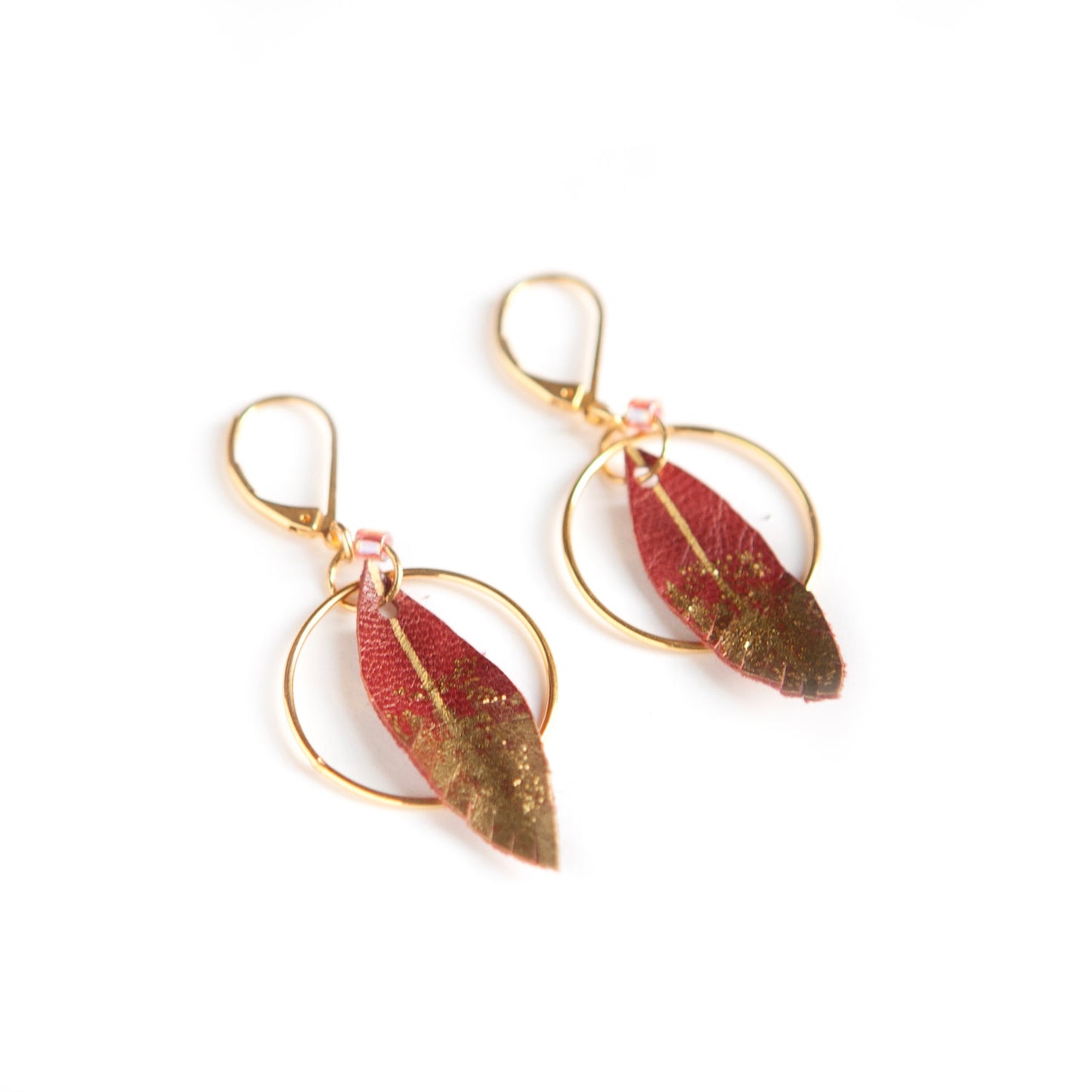Feather hoop earrings in dark red leather
