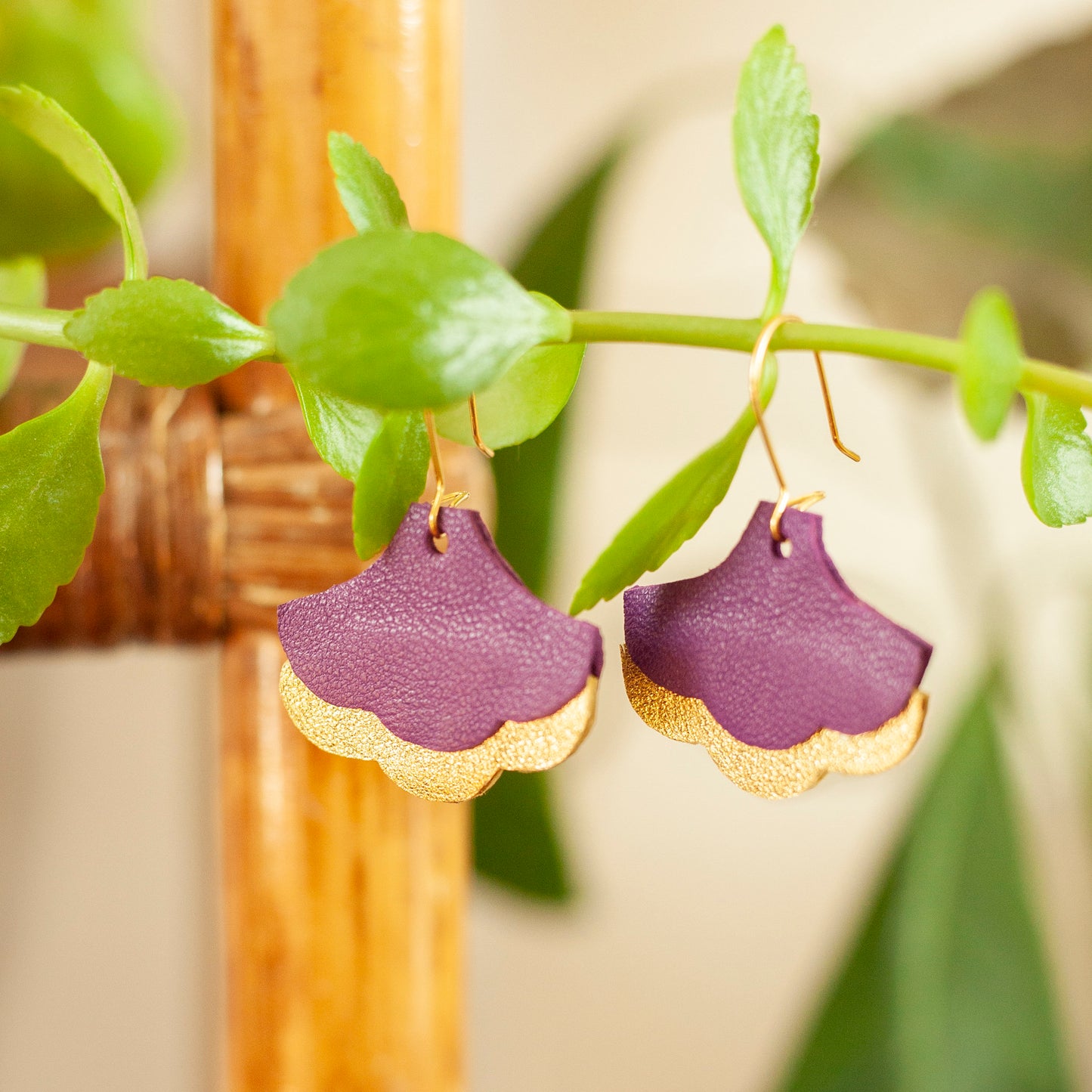 Ginkgo Biloba earrings in purple and gold leather