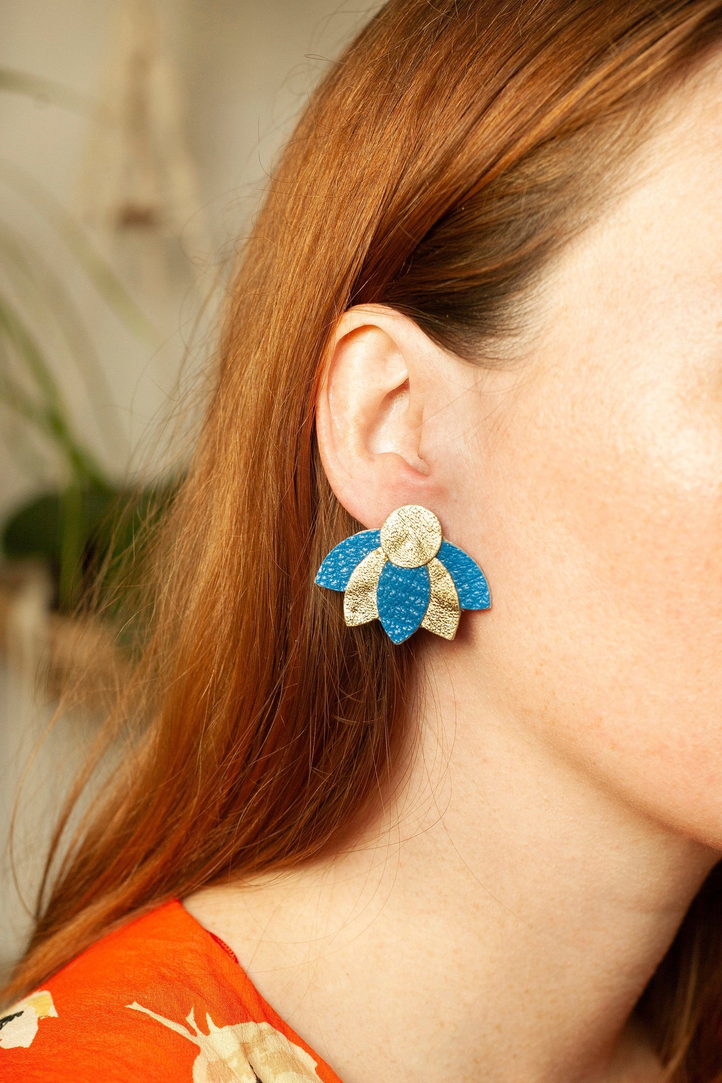 Blue and gold leather fan flower earrings