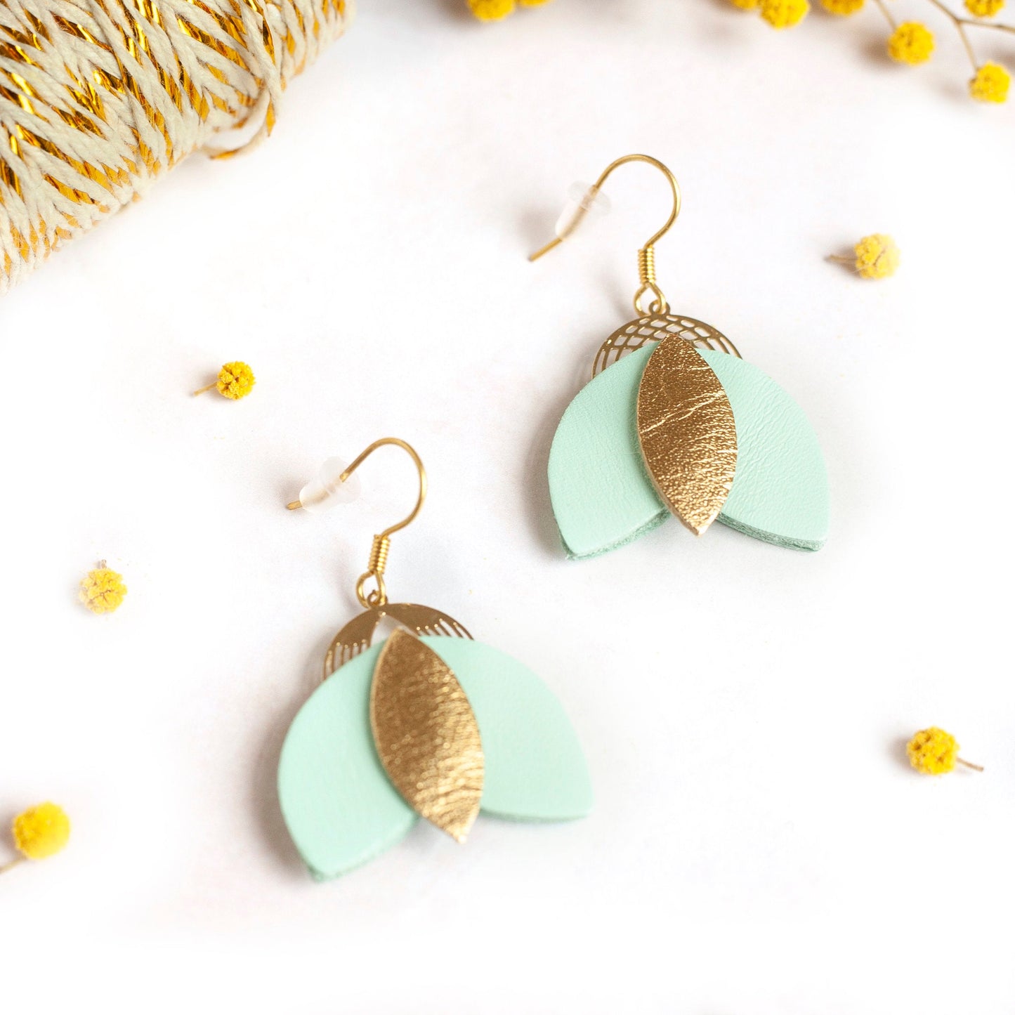 Cigales earrings in mint green and gold leather