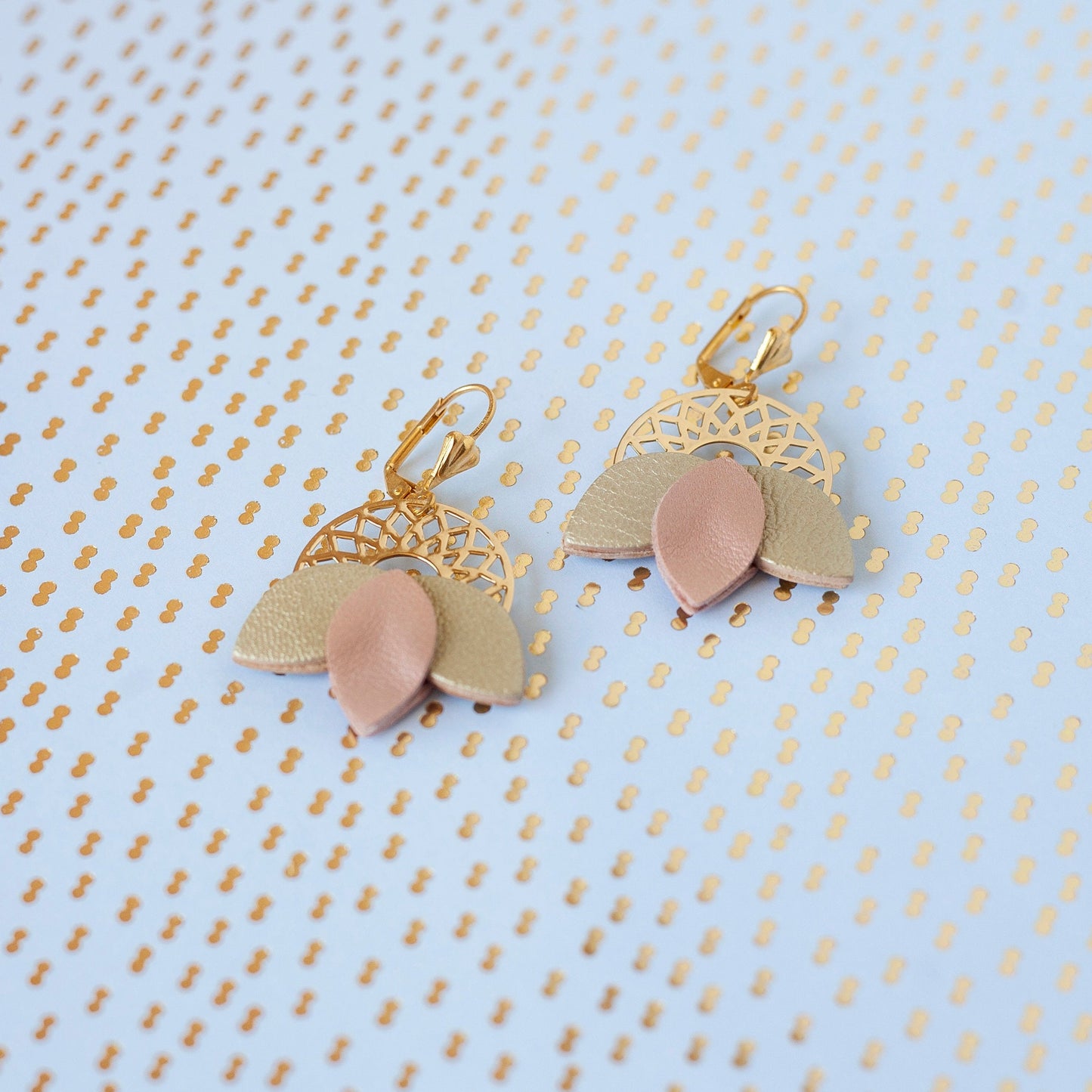 Matte pink and gold leather rosette earrings