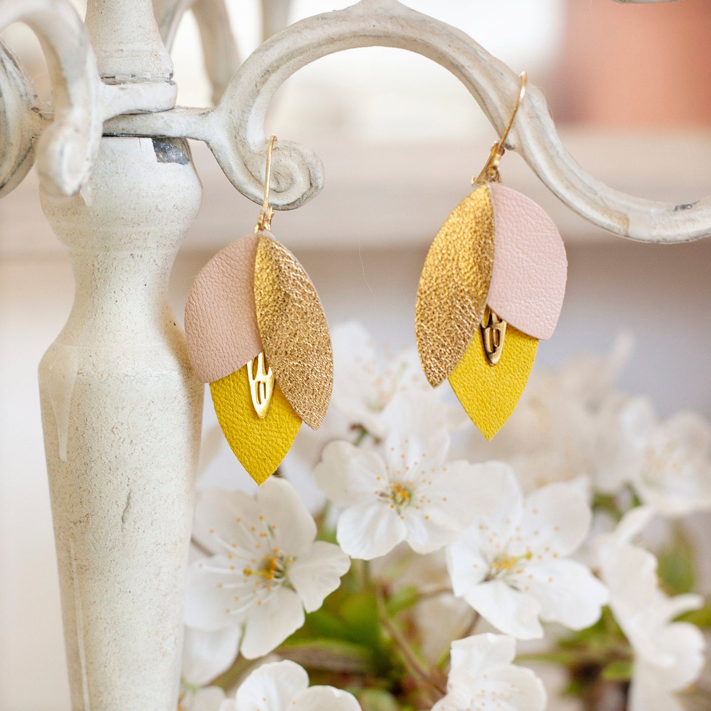 Flower petal earrings in yellow and rose gold-plated leather