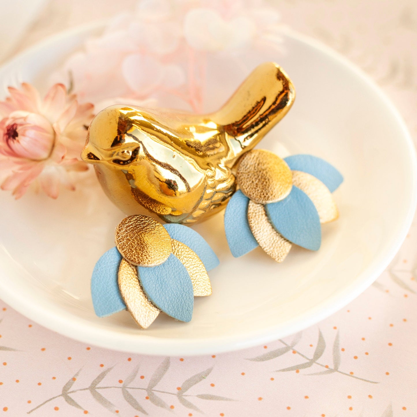 Blue and gold leather earrings