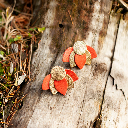 Small lotus flower earrings in orange-red and gold leather