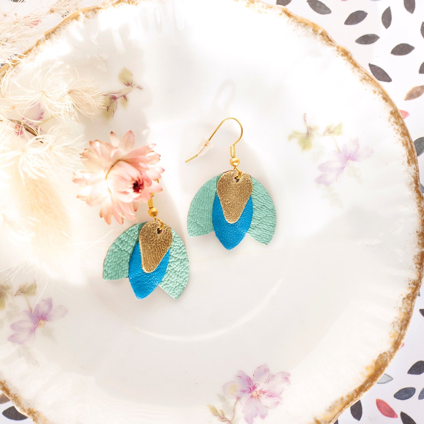 Blue leather and gold flower “Gentiane” earrings