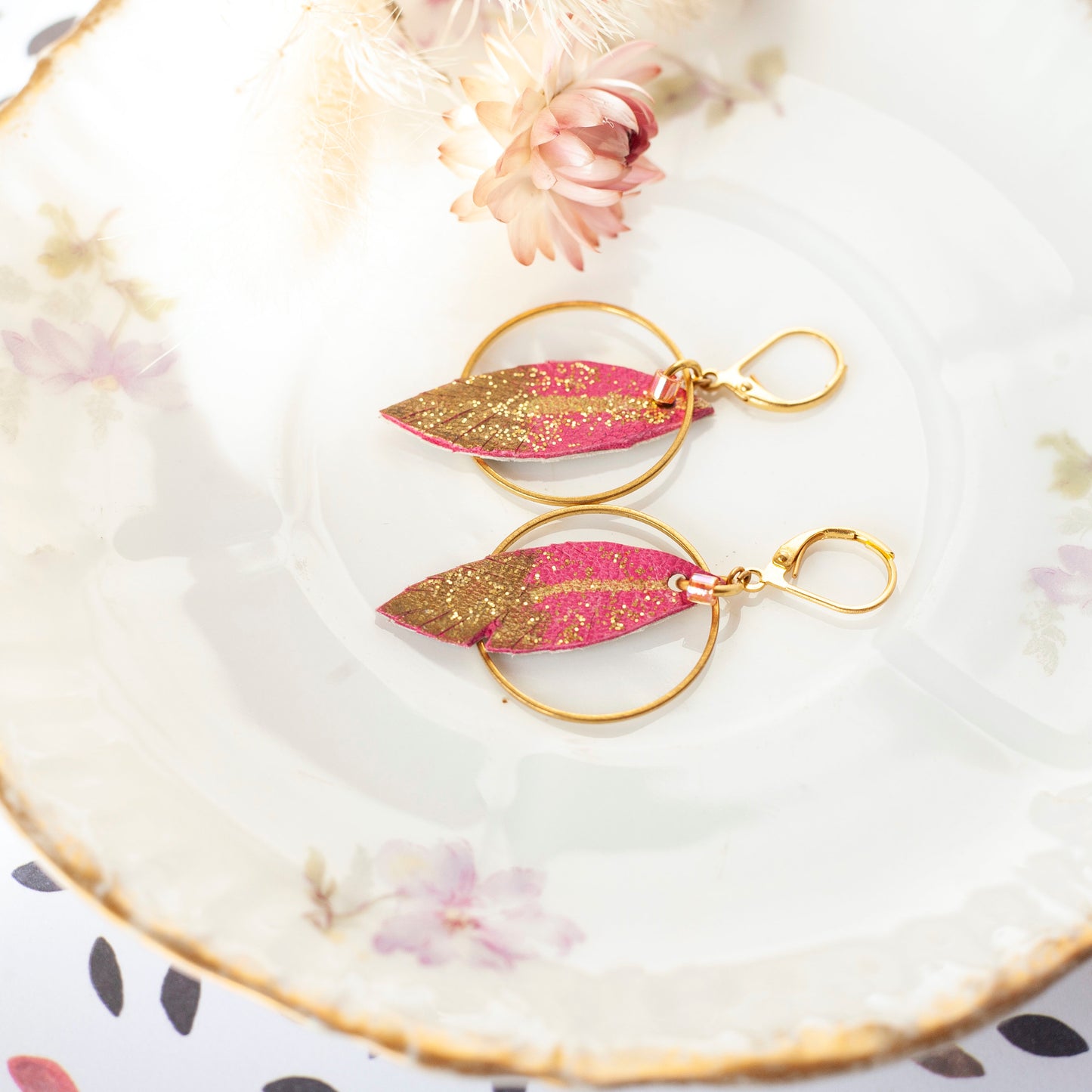 Fuchsia pink and gold leather feather hoop earrings